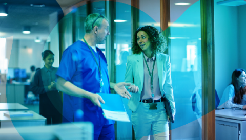 Two healthcare professionals walking